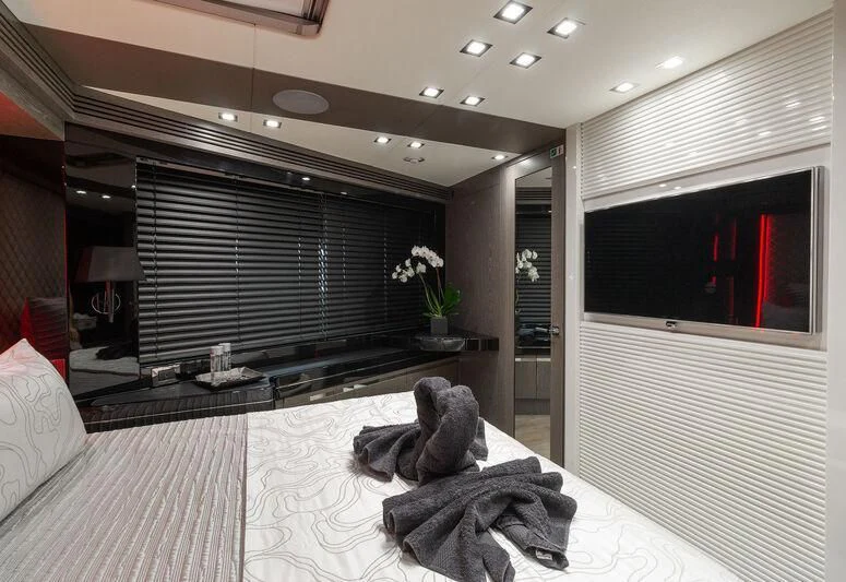 a couple of cats on a bed aboard MATZU Yacht for Sale