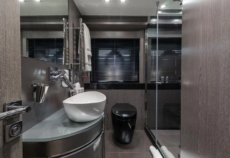 a bathroom with a sink and a mirror aboard MATZU Yacht for Sale