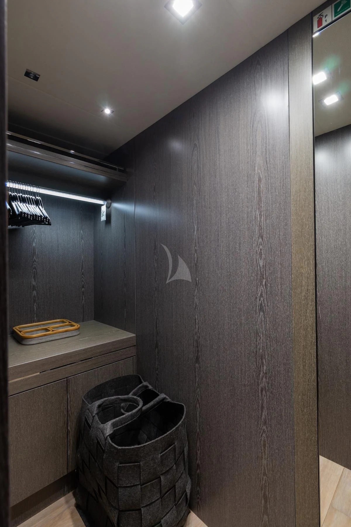 a wall with a metal bucket and a metal bucket on it aboard MATZU Yacht for Sale