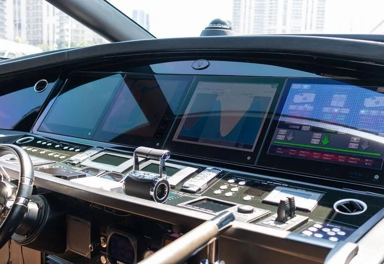 a desk with a computer and monitor aboard MATZU Yacht for Sale