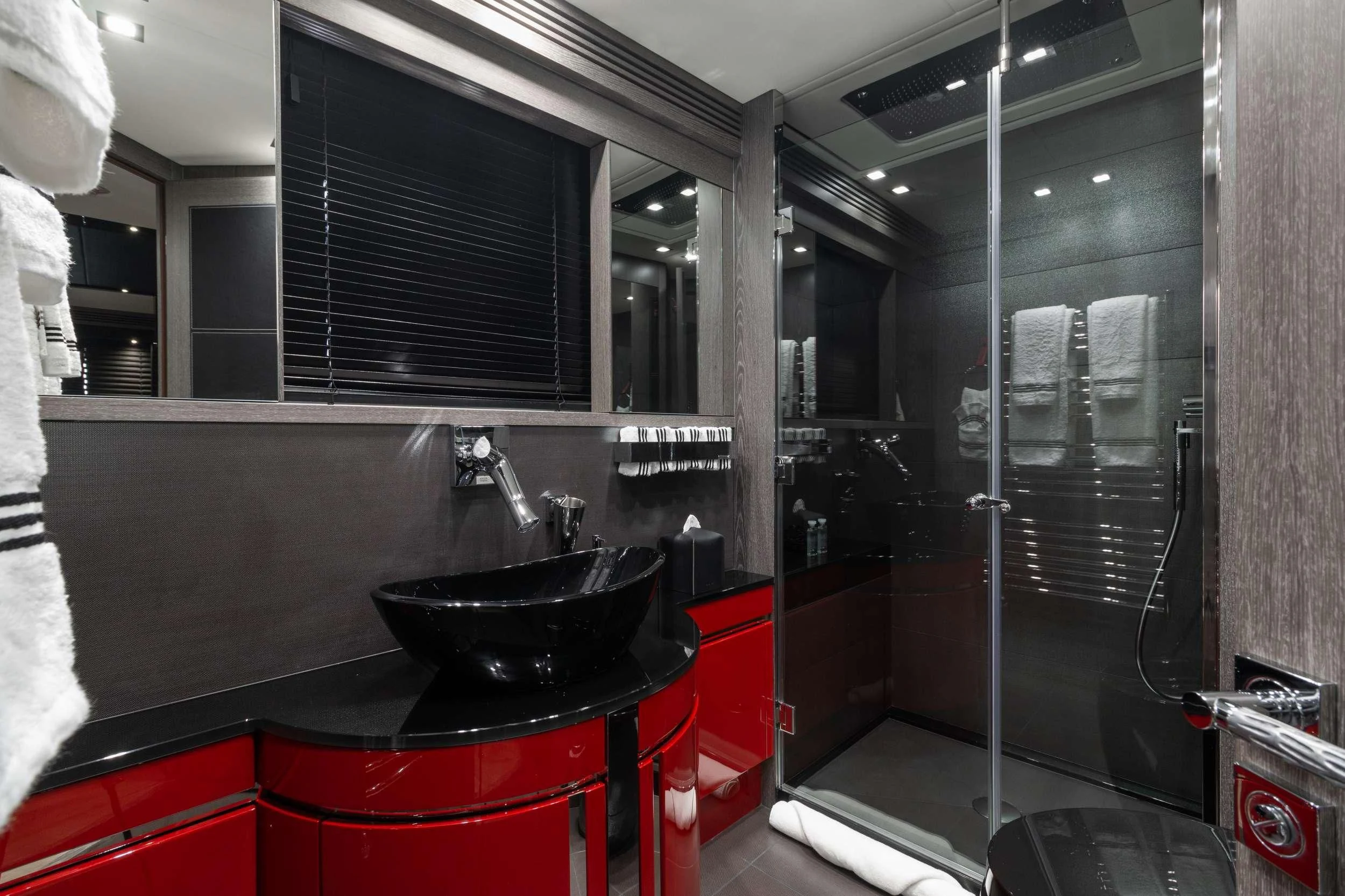 a kitchen with a sink and a large mirror aboard MATZU Yacht for Sale