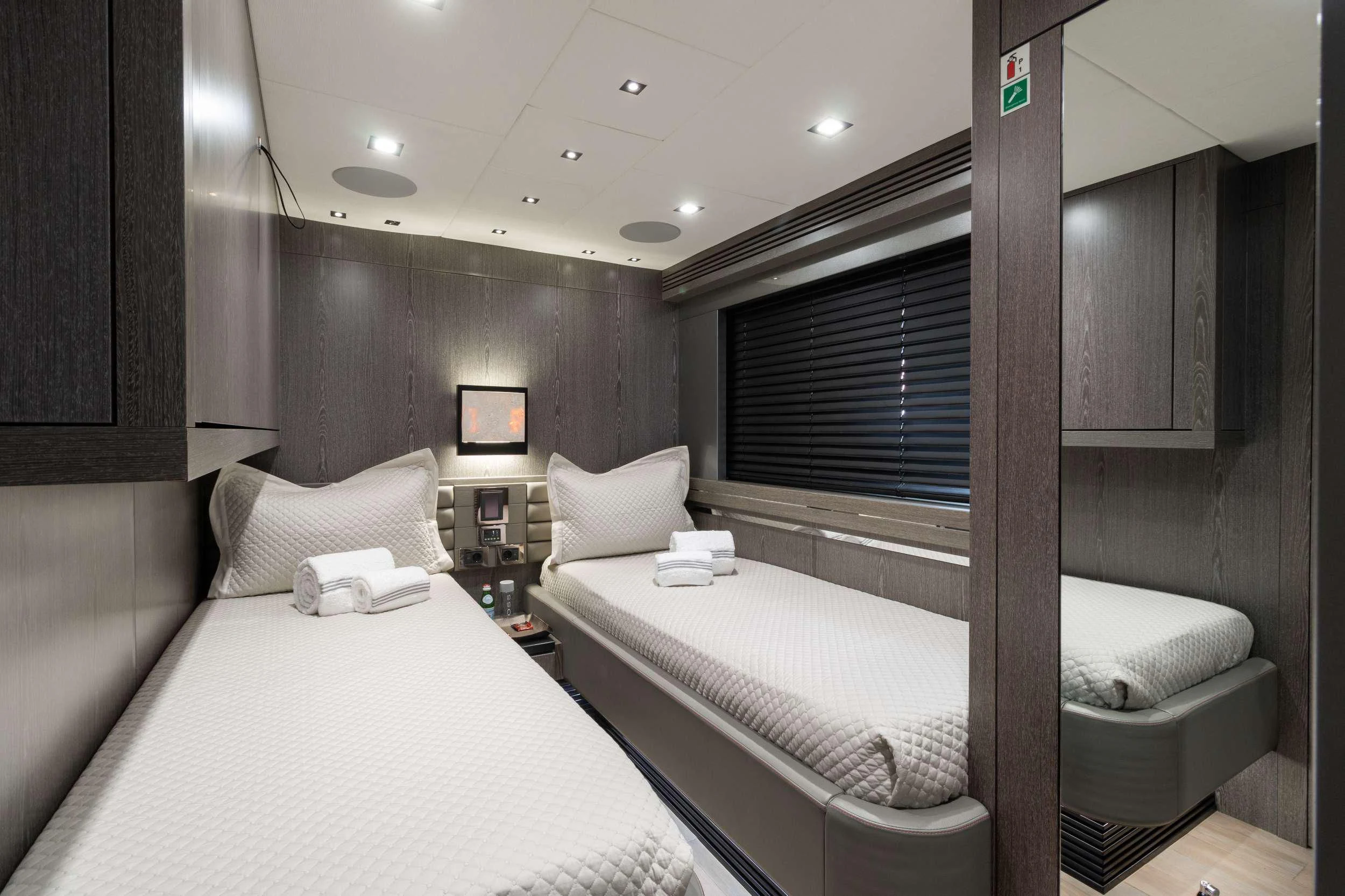 a couple of beds in a hotel room aboard MATZU Yacht for Sale