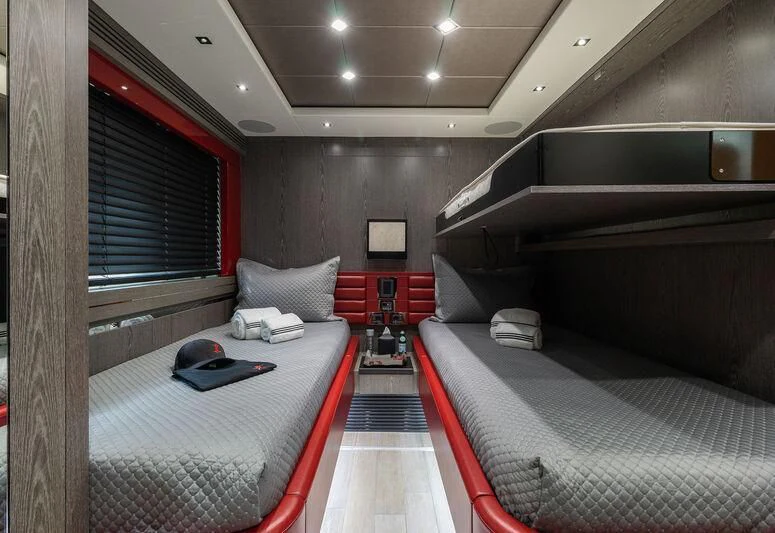 a room with a bed and a desk aboard MATZU Yacht for Sale