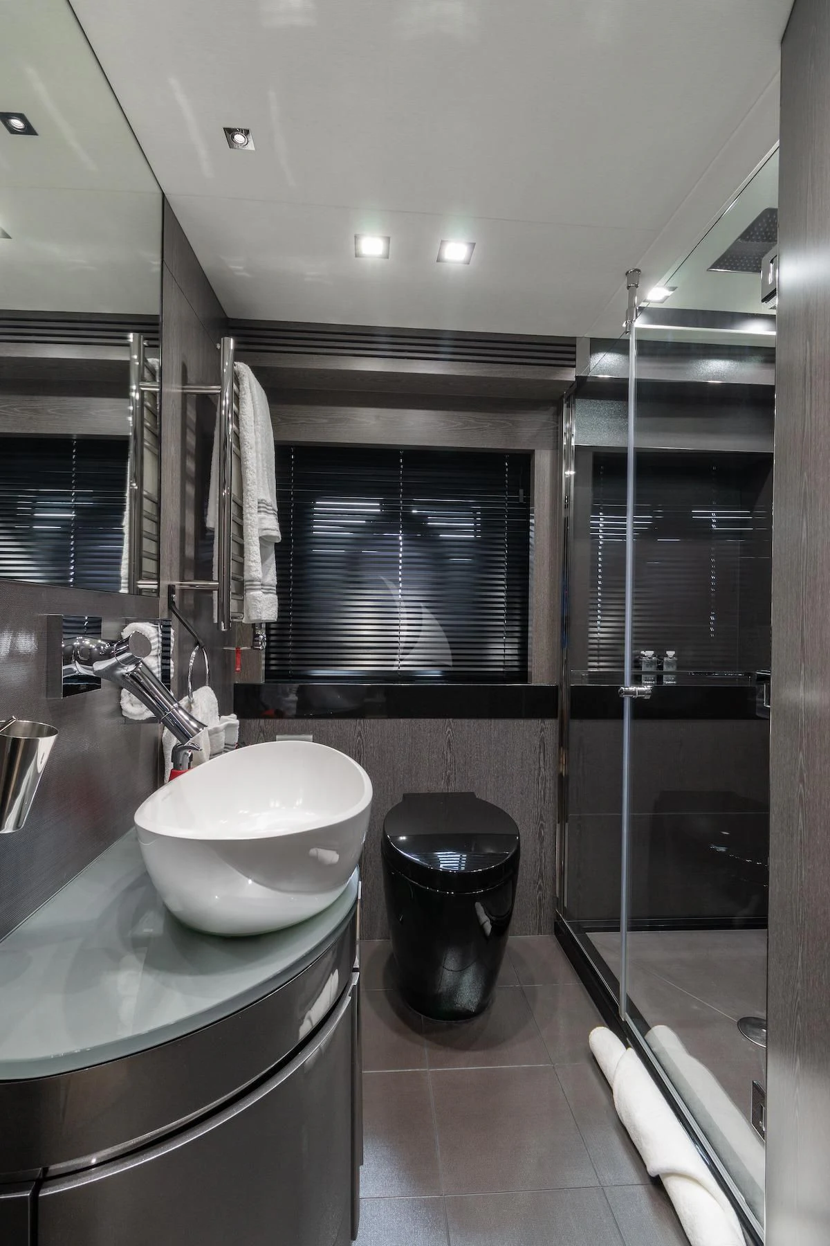 a bathroom with a sink and a mirror aboard MATZU Yacht for Sale
