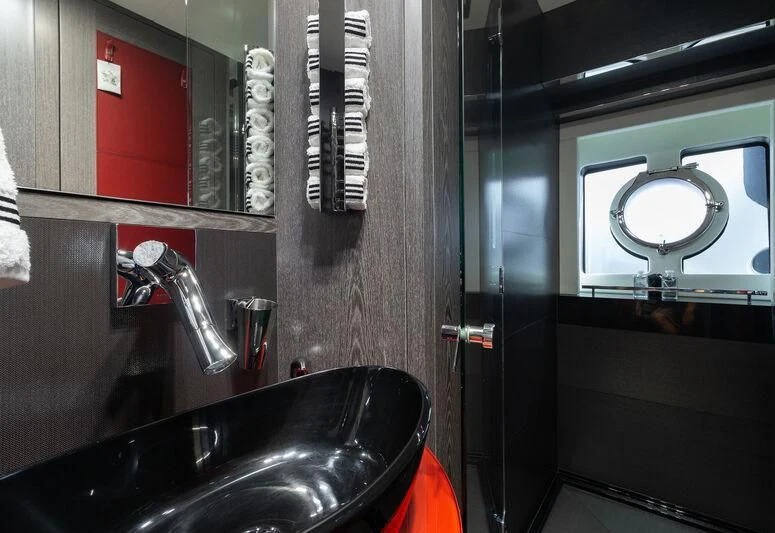 a bathroom with a sink and mirror aboard MATZU Yacht for Sale
