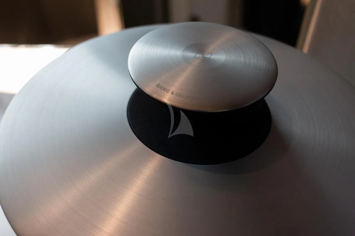 a round white object with a black circle on a white surface aboard MATZU Yacht for Sale