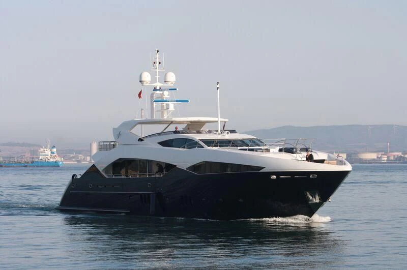 a large boat in the water aboard NEVER SAY NEVER Yacht for Sale