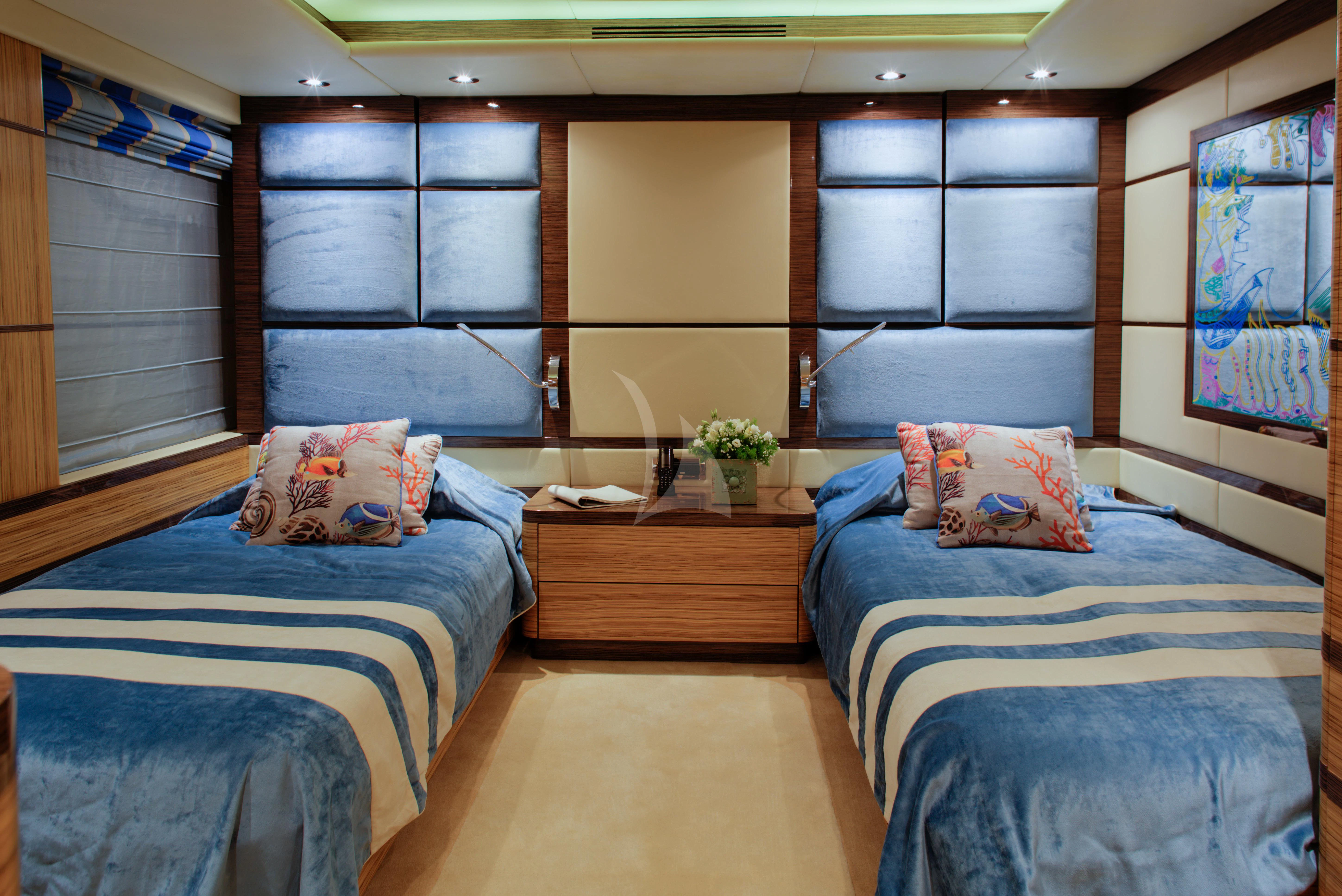 a room with two beds aboard I SEA Yacht for Charter
