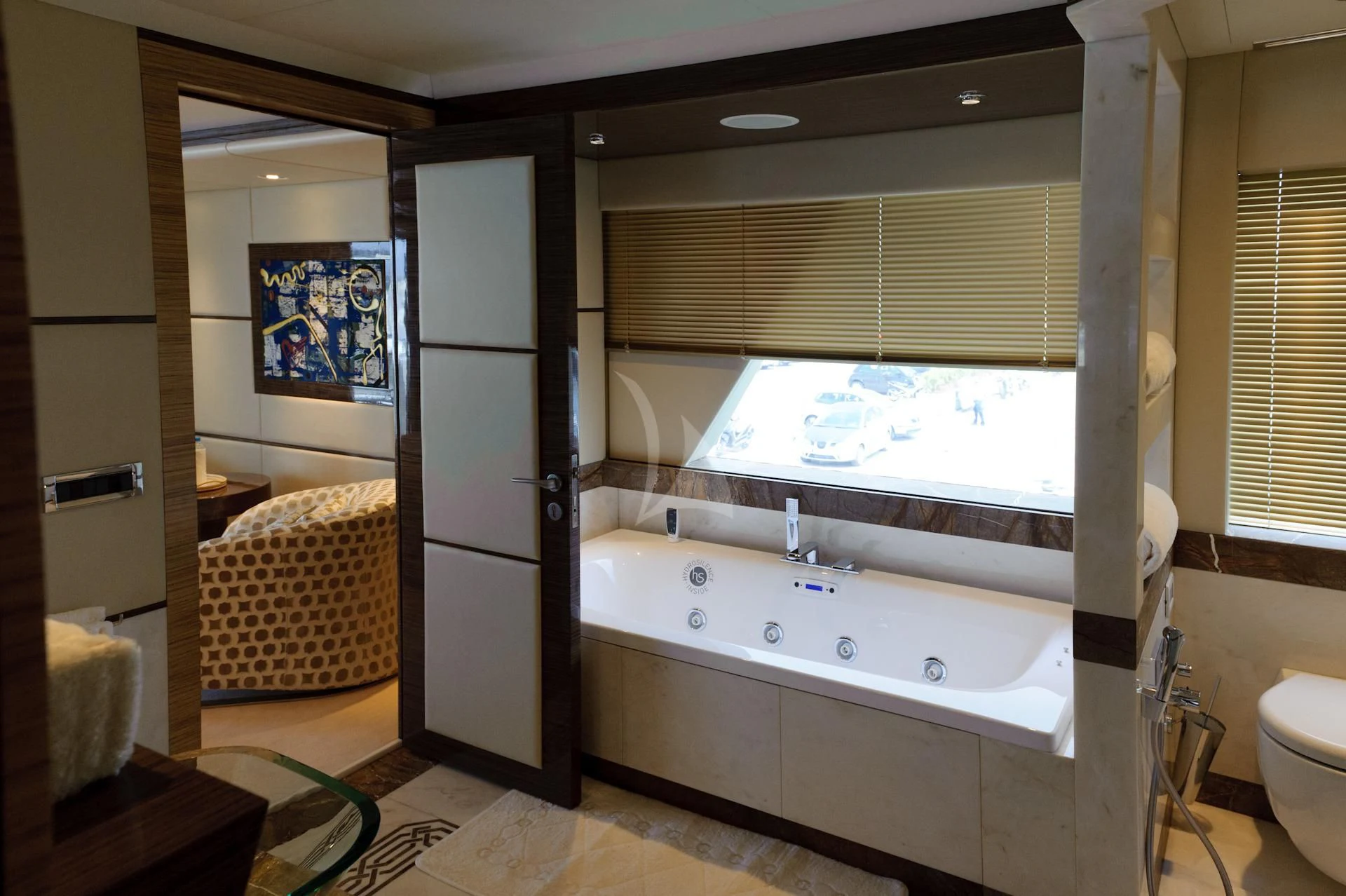 a bathroom with a tub and a sink aboard I SEA Yacht for Charter