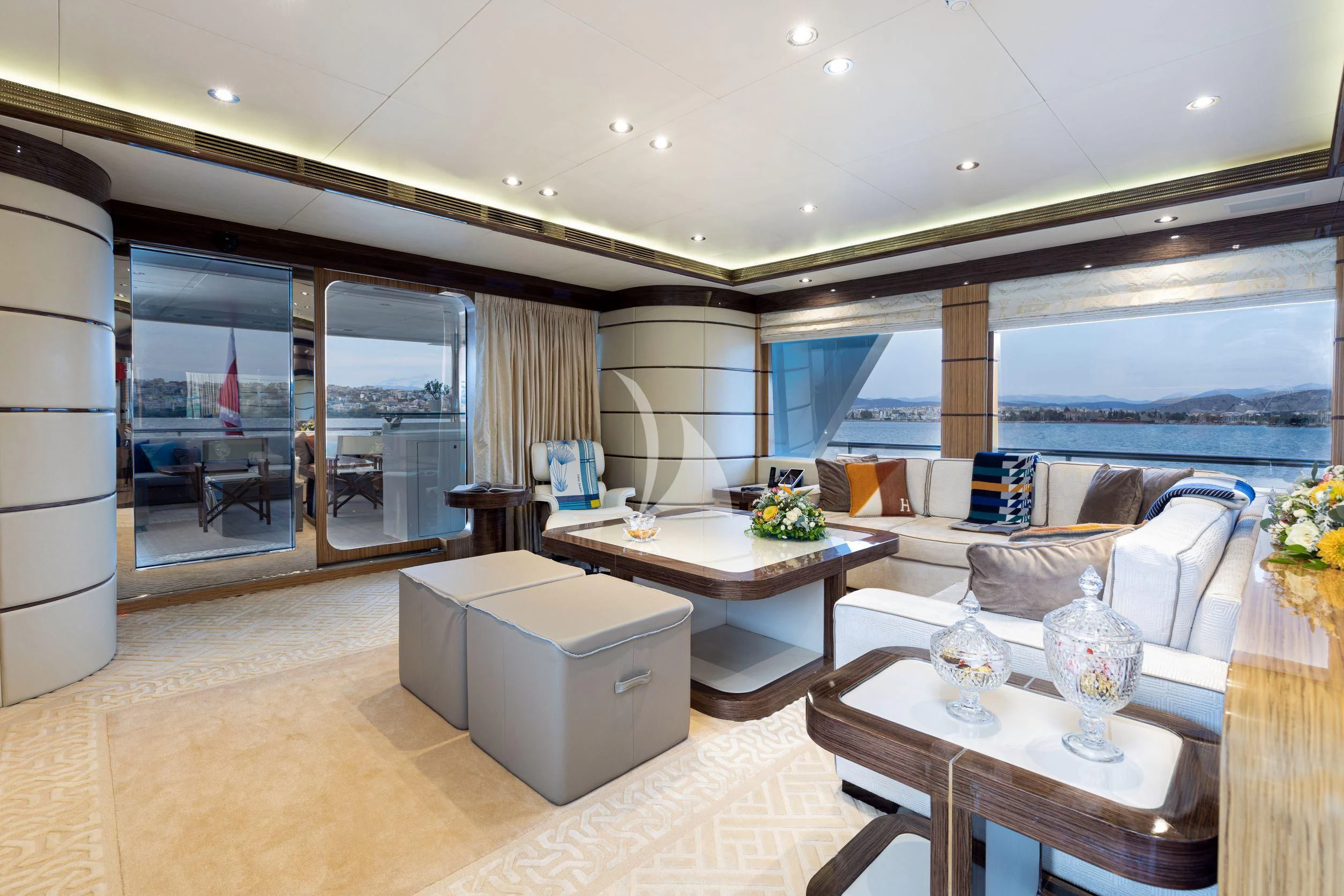 a room with a table and chairs aboard I SEA Yacht for Charter