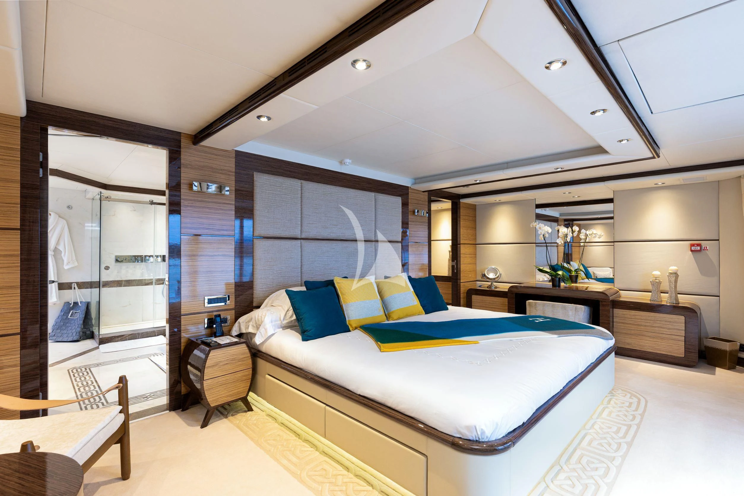 a modern bedroom with a bed aboard I SEA Yacht for Charter