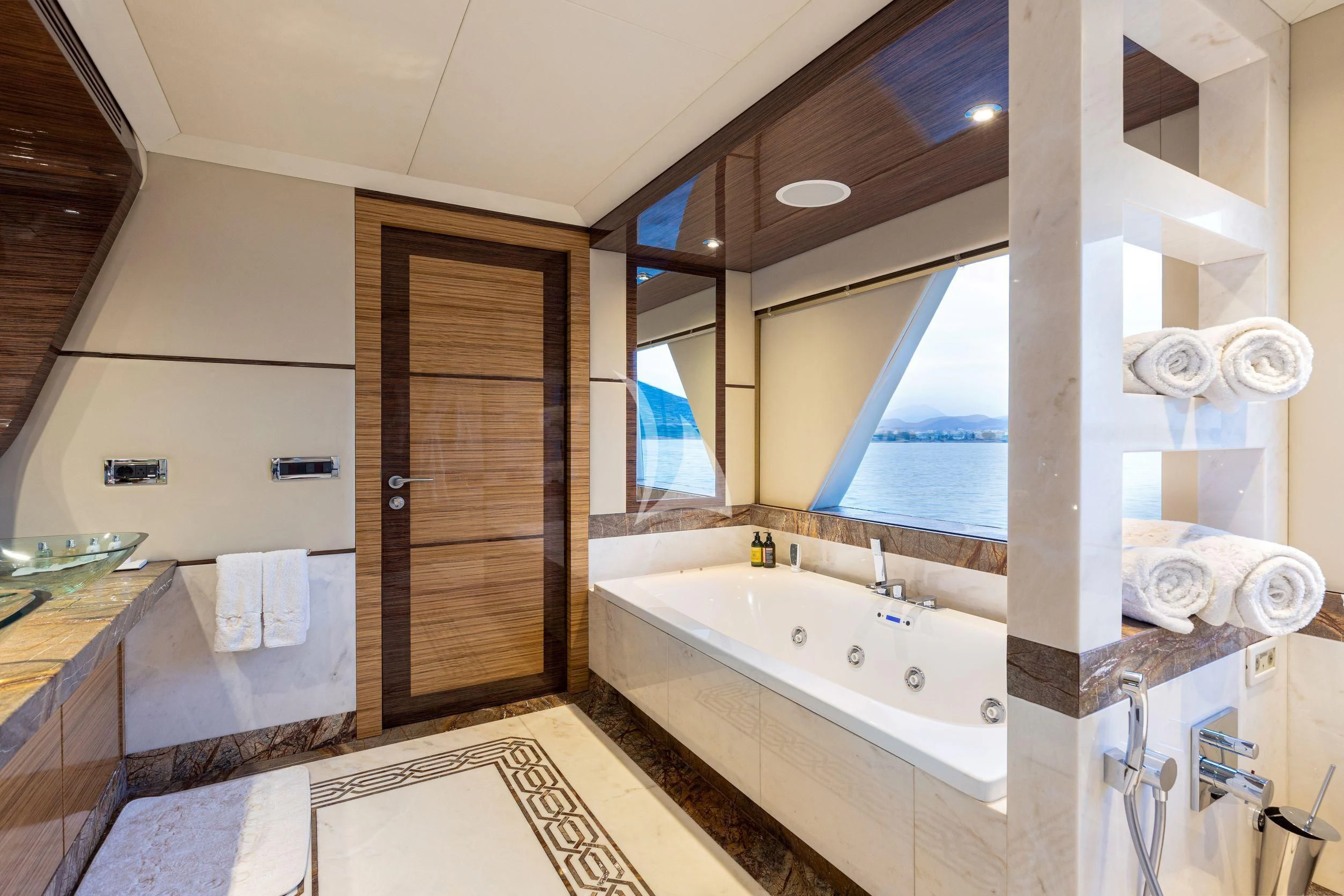 a bathroom with a large tub aboard I SEA Yacht for Charter