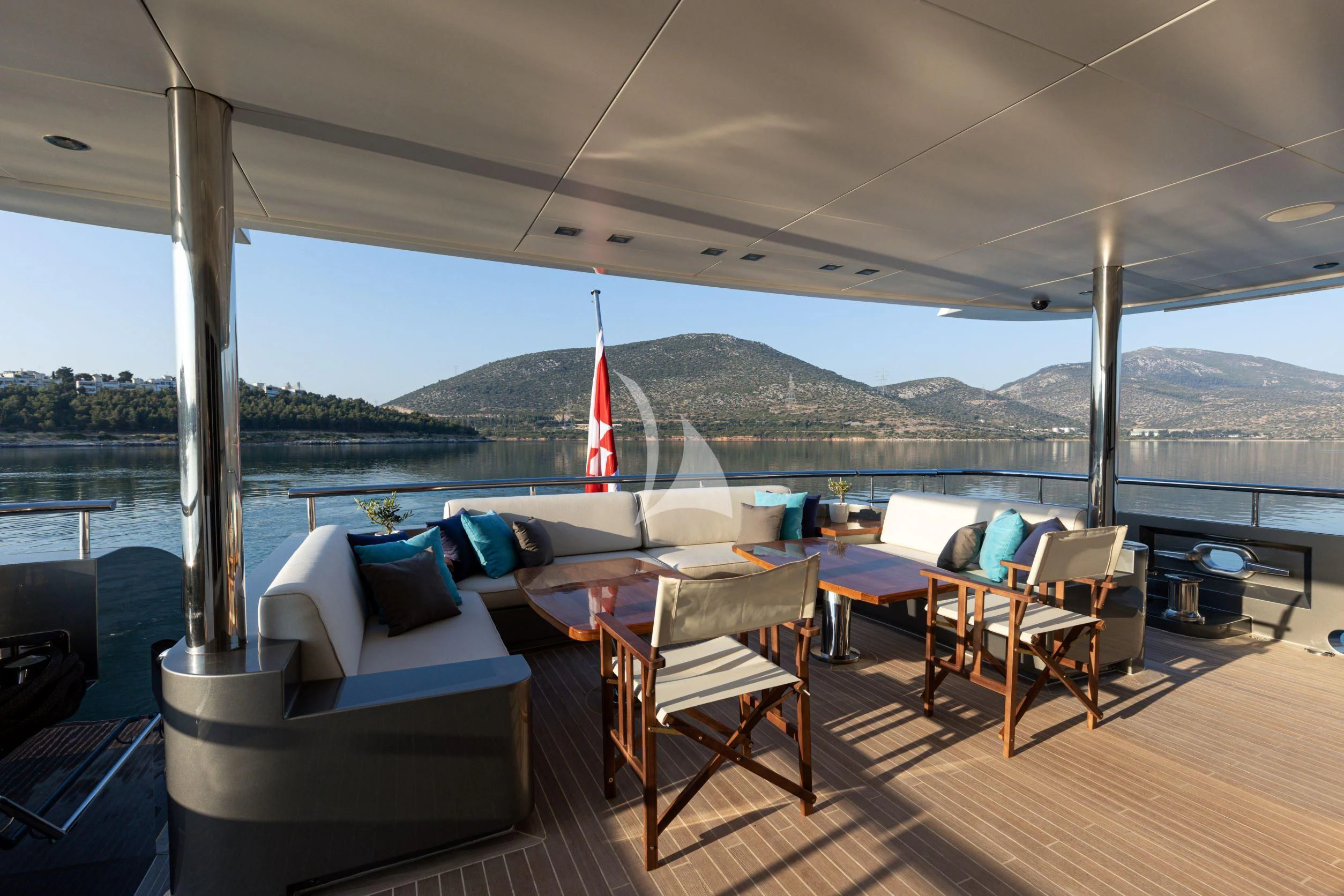 a deck with chairs and tables aboard I SEA Yacht for Charter