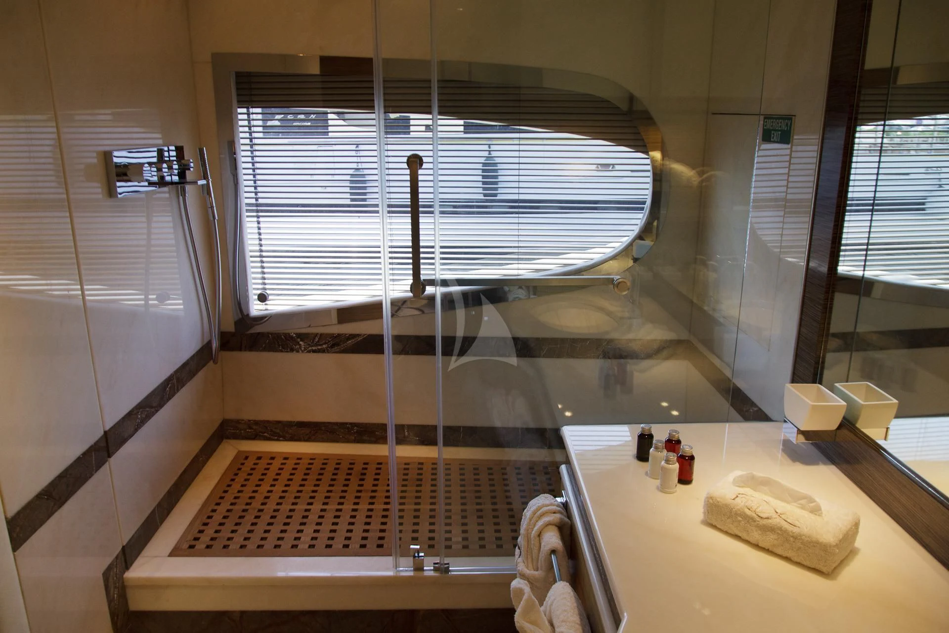 a bathroom with a large window aboard I SEA Yacht for Charter