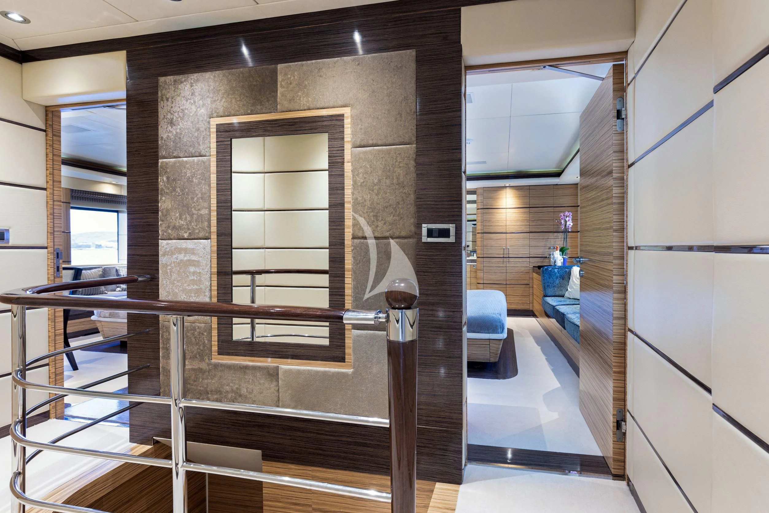 a room with a fireplace and a glass door aboard I SEA Yacht for Charter