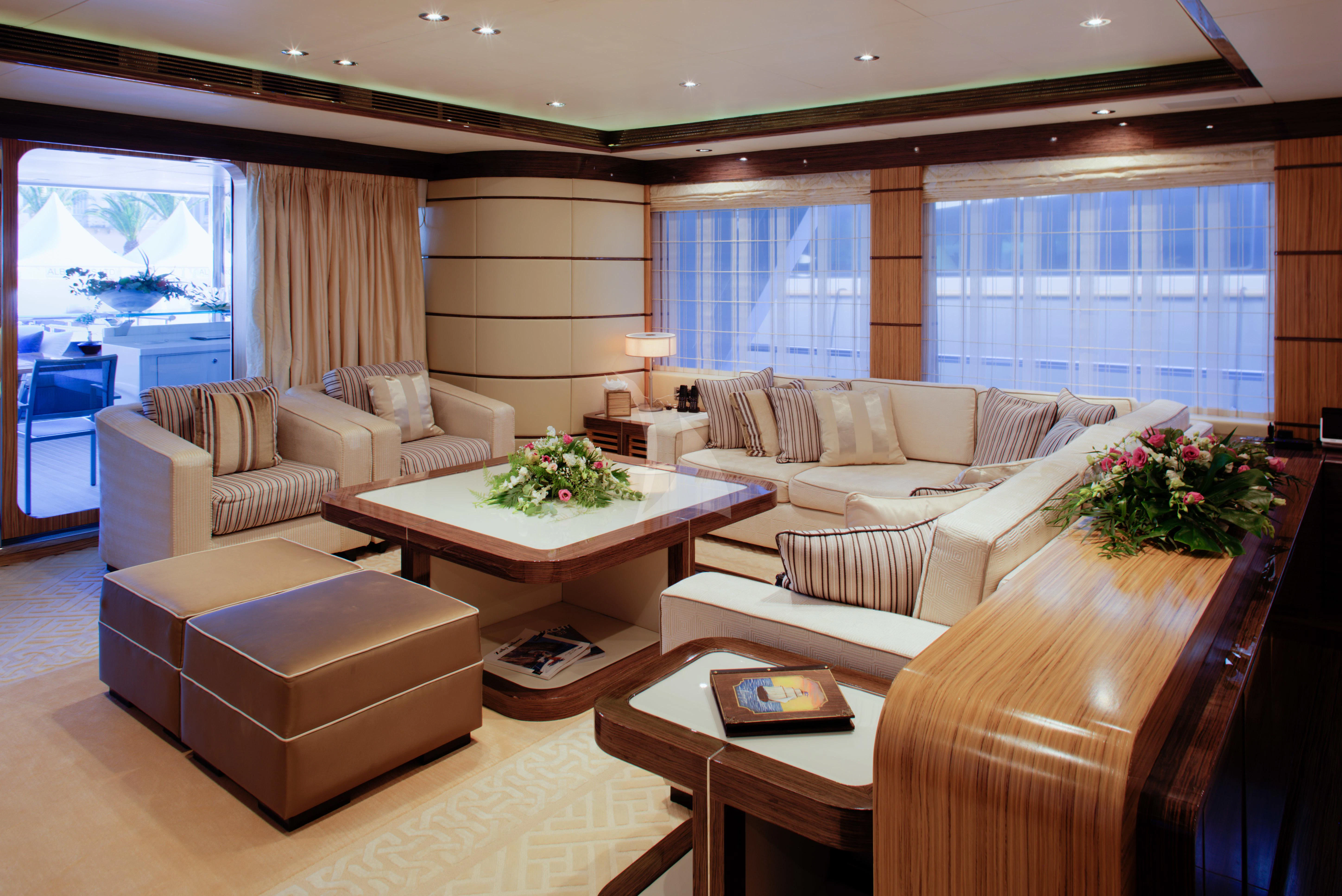a living room with a large window aboard I SEA Yacht for Charter