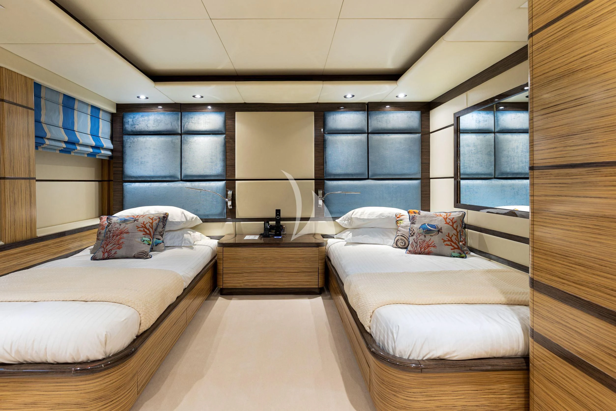 a room with a couple of beds aboard I SEA Yacht for Charter
