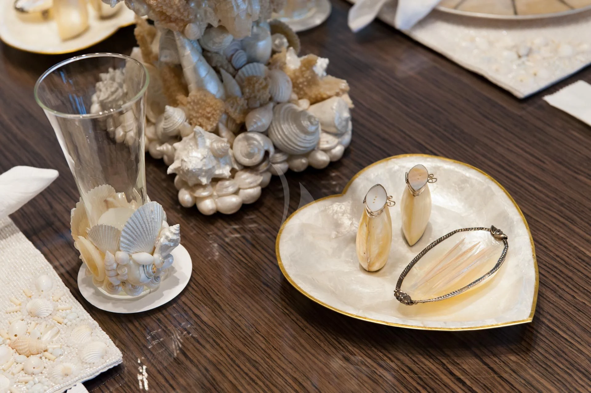 a table with plates of food and glasses on it aboard I SEA Yacht for Charter