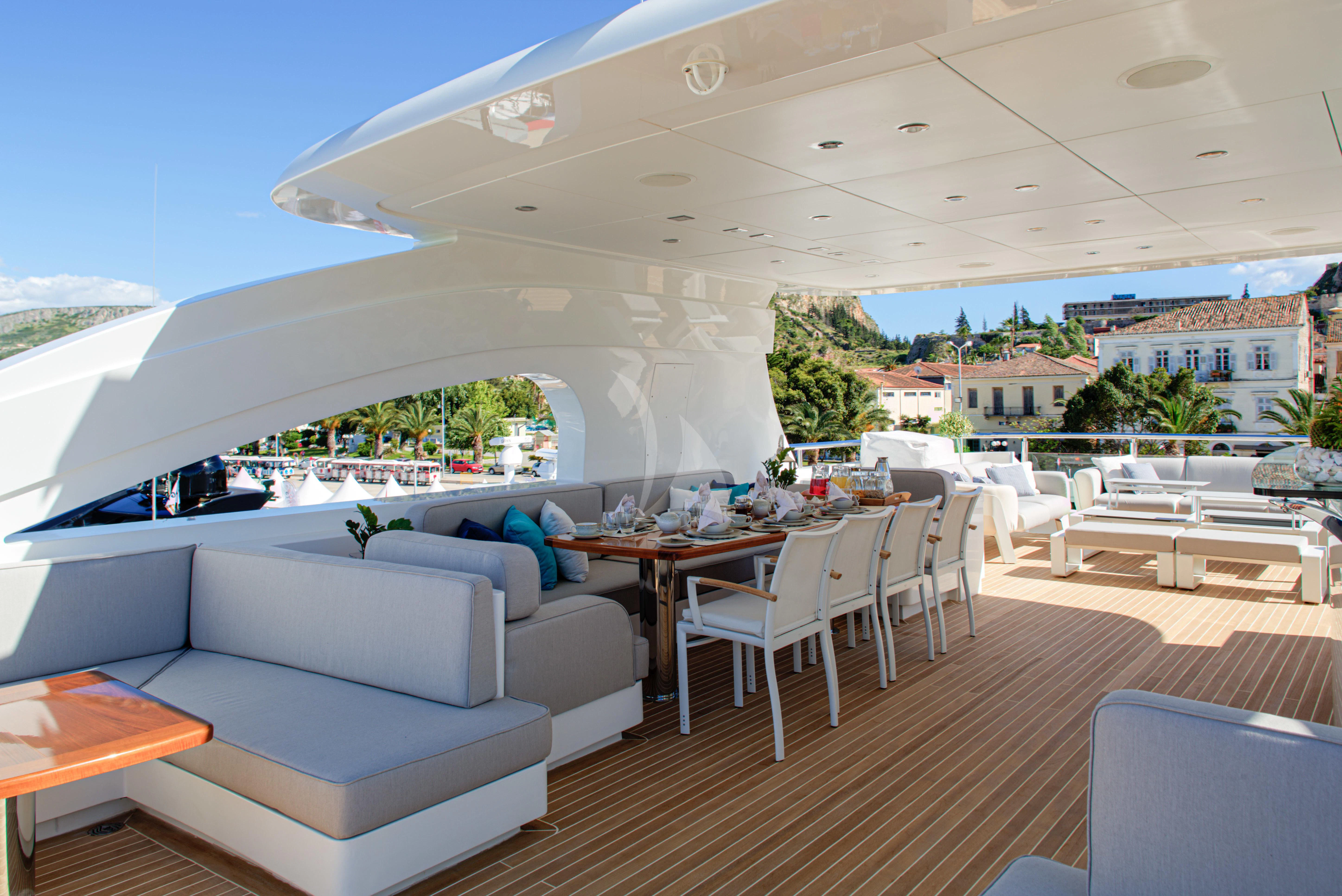 a living room with a large patio aboard I SEA Yacht for Charter