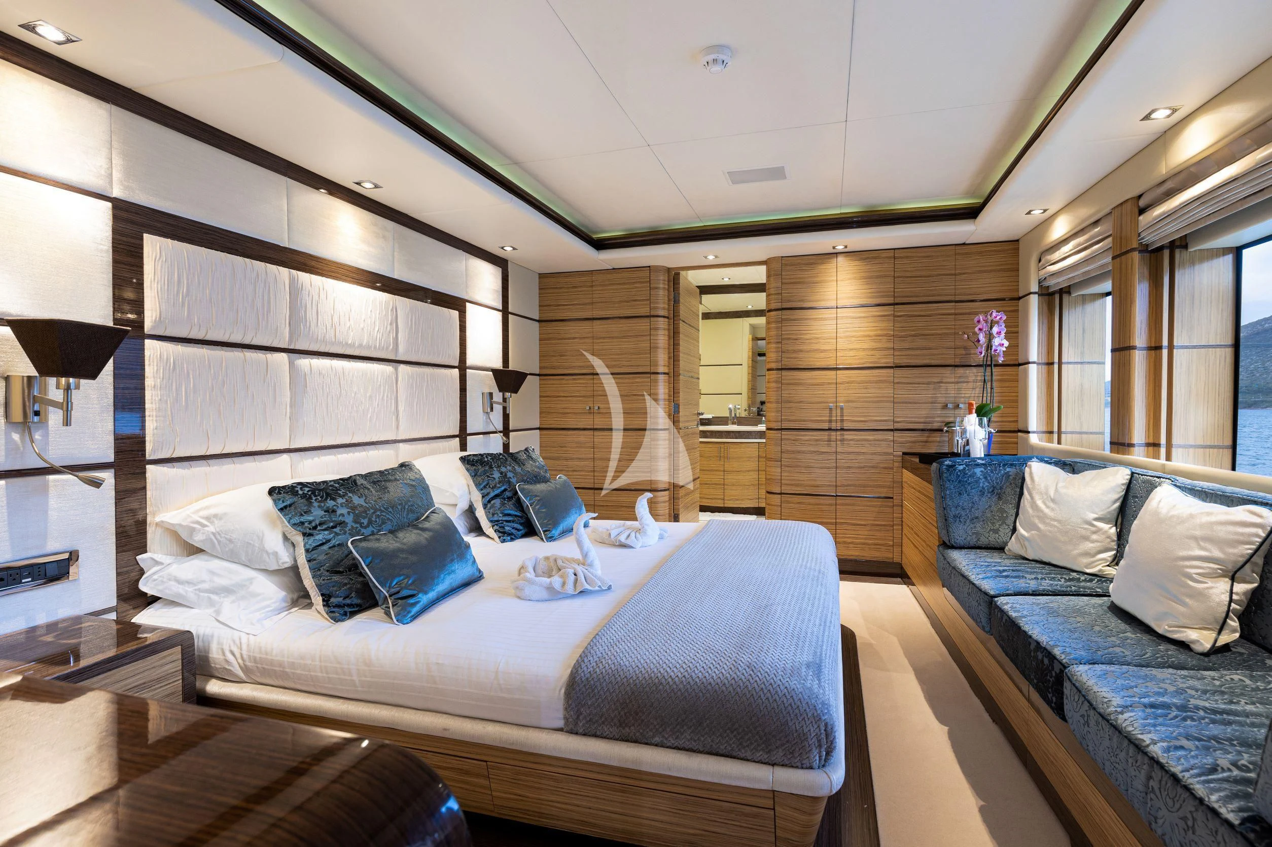 a room with a couple beds aboard I SEA Yacht for Charter