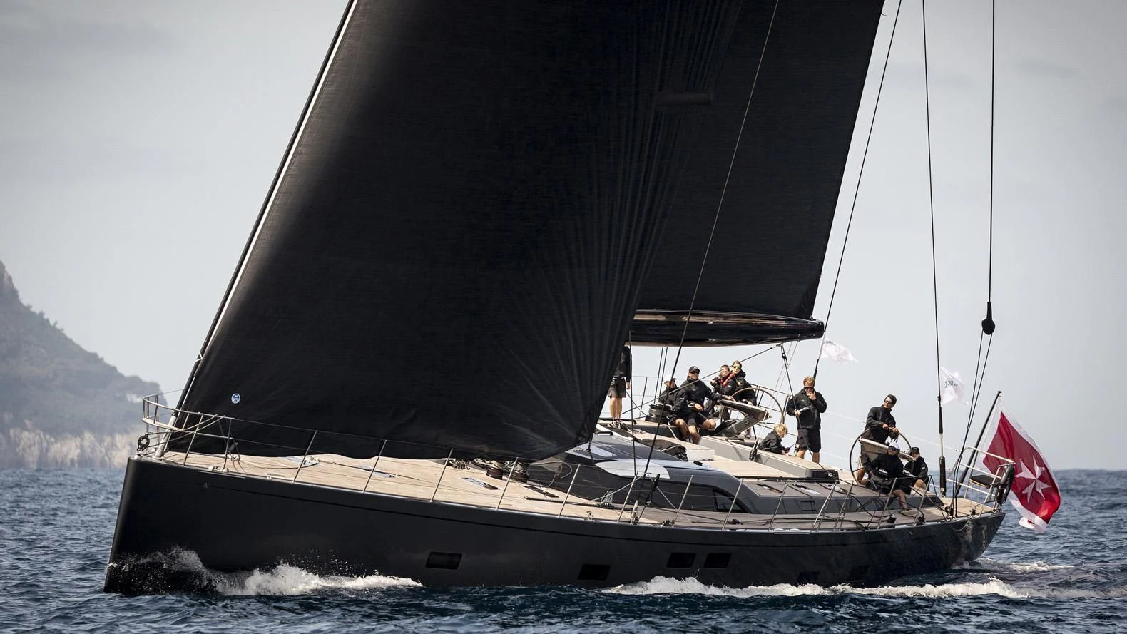 a sailboat with people on it aboard G4CE Yacht for Sale