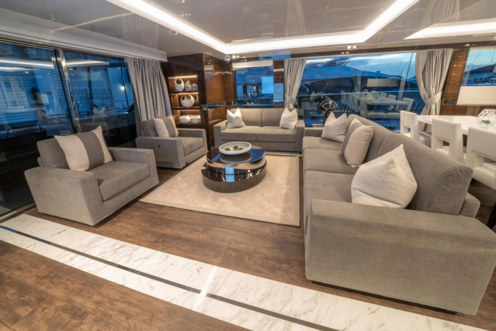 a living room with a large window aboard PEARL Yacht for Sale
