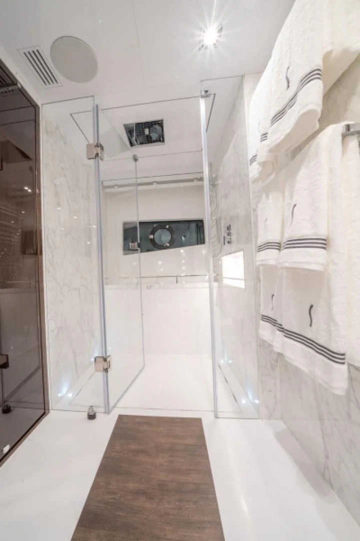 a bathroom with a shower unit aboard PEARL Yacht for Sale