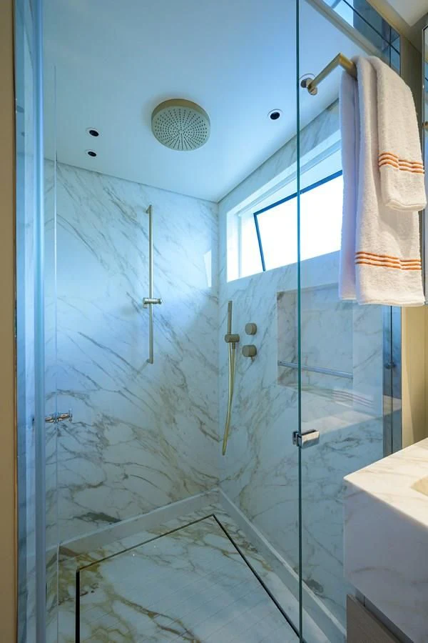 a shower with a glass door aboard PEARL Yacht for Sale