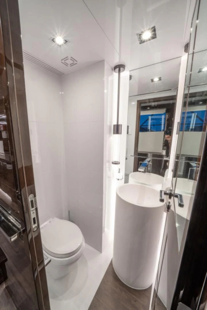 a bathroom with a glass shower aboard PEARL Yacht for Sale
