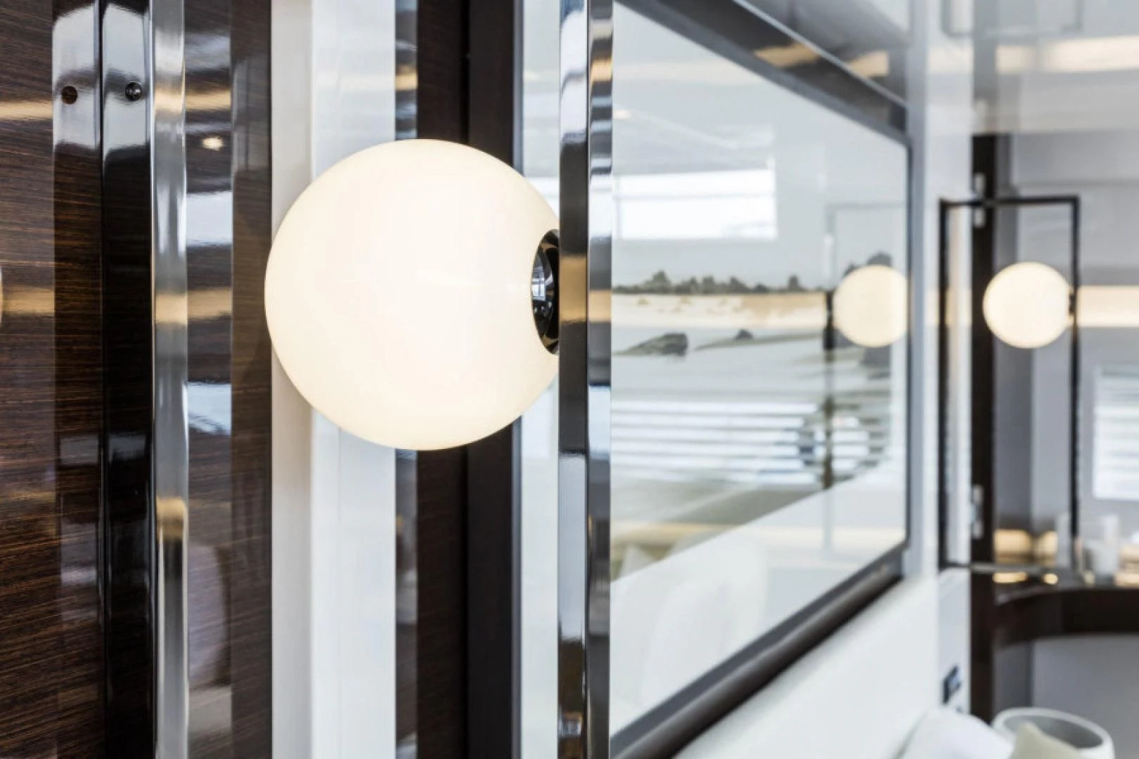 a white balloon from a ceiling aboard PEARL Yacht for Sale