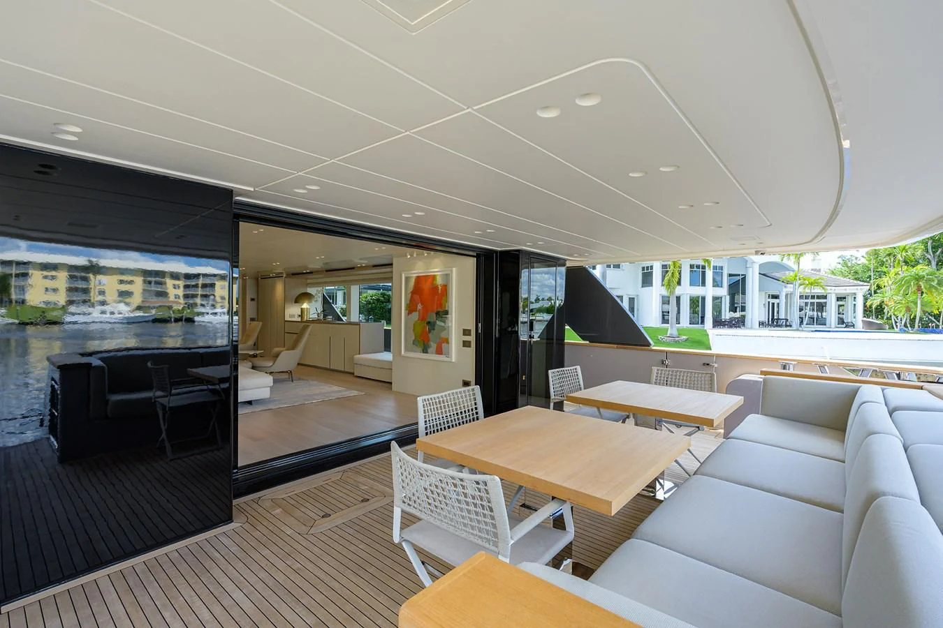 a living room with a large window aboard PEARL Yacht for Sale
