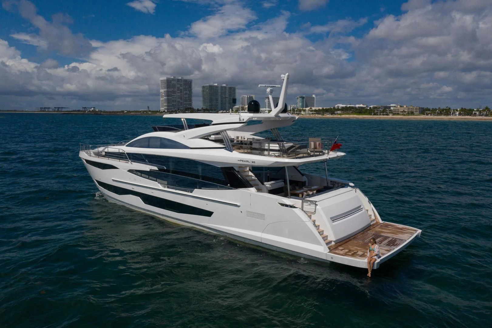 a white yacht in the water aboard PEARL Yacht for Sale