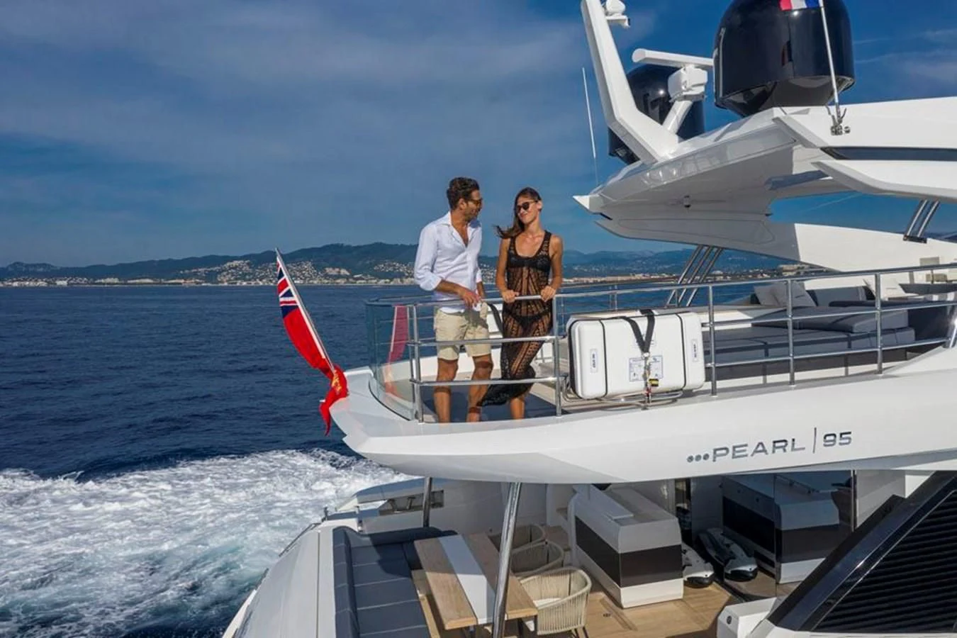a man and woman on a boat aboard PEARL Yacht for Sale