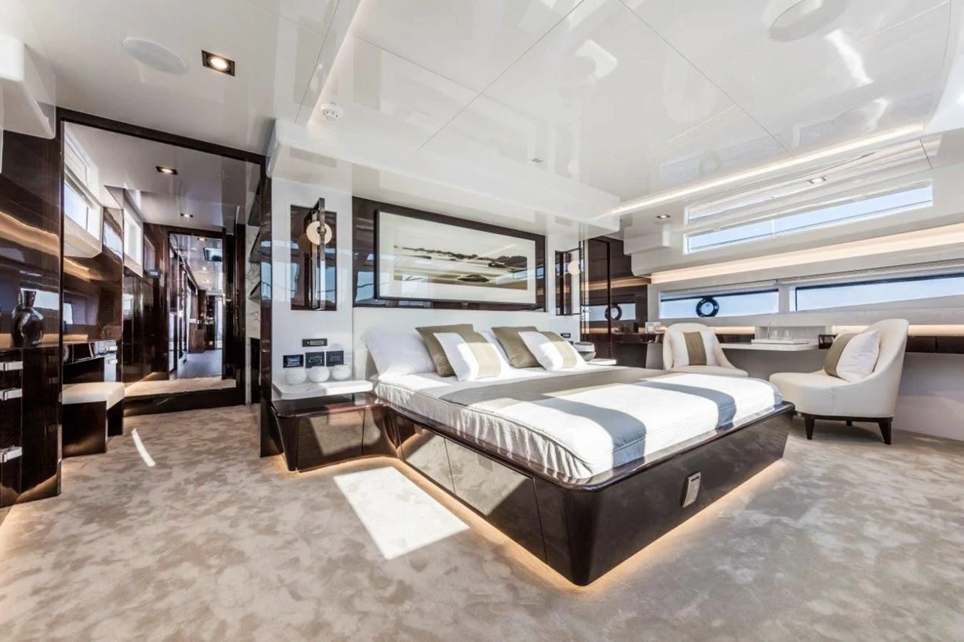 a large bedroom with a large bed aboard PEARL Yacht for Sale