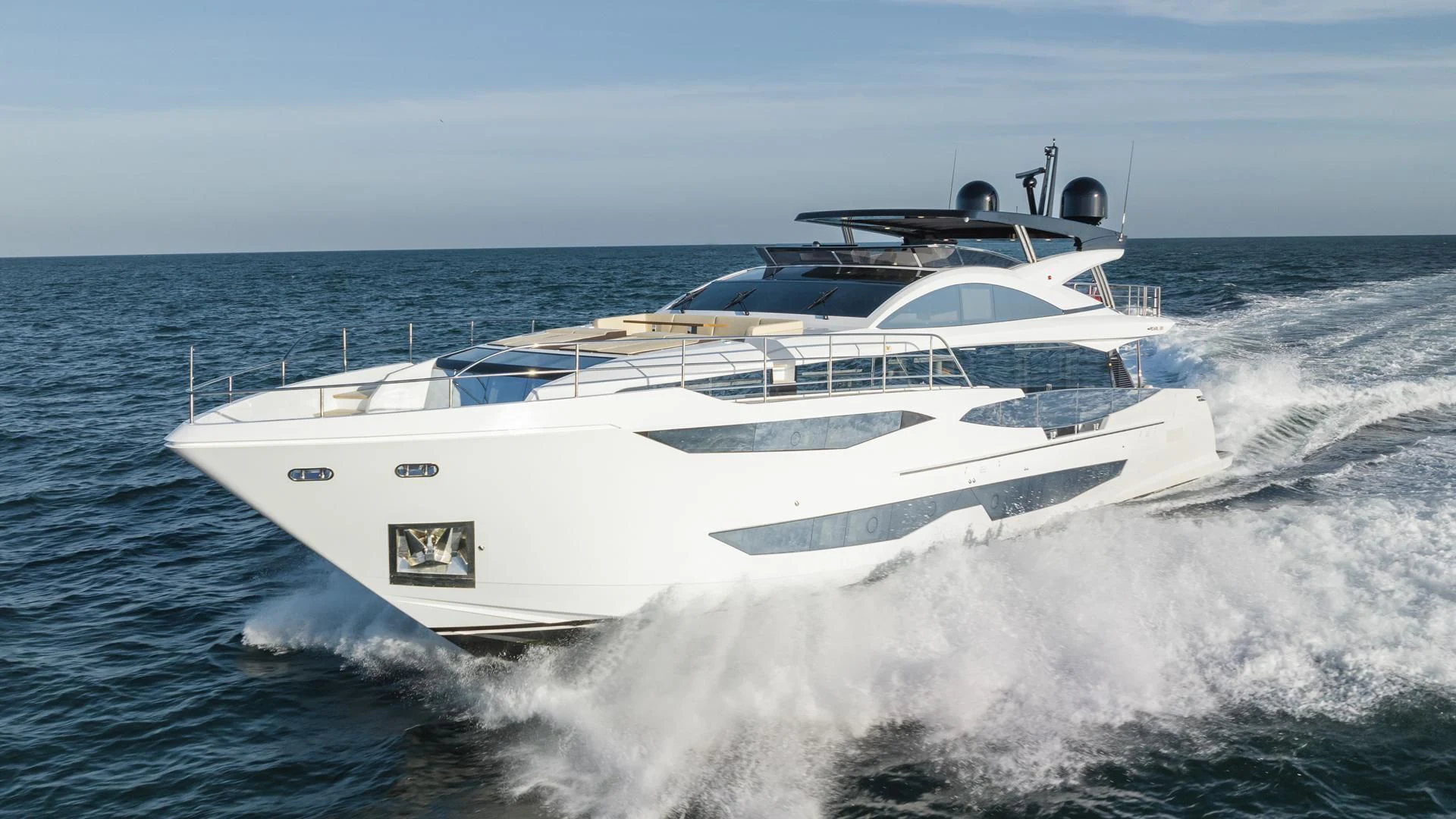 a white yacht on the water aboard PEARL Yacht for Sale