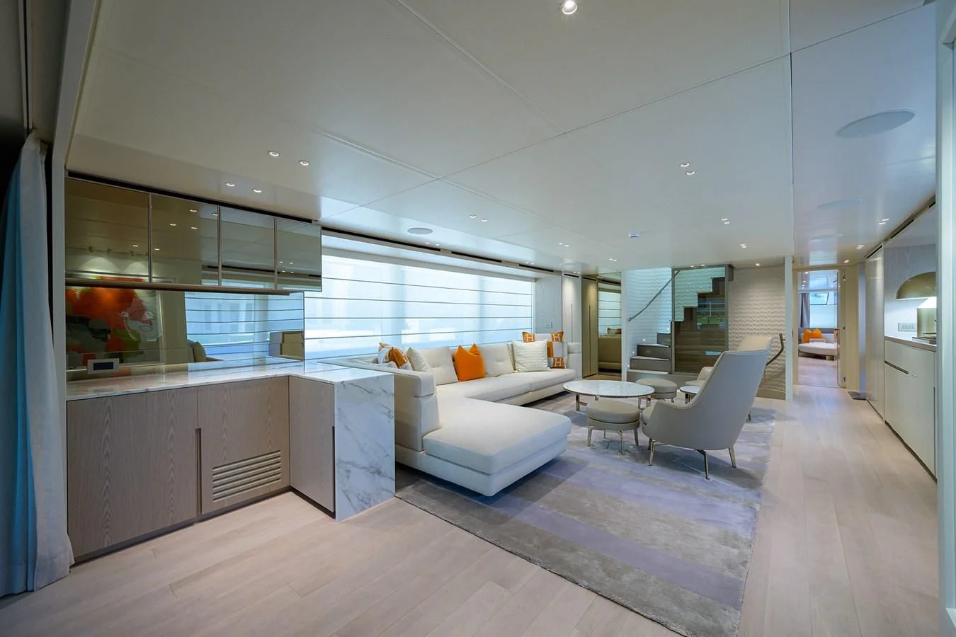a modern looking living room aboard PEARL Yacht for Sale