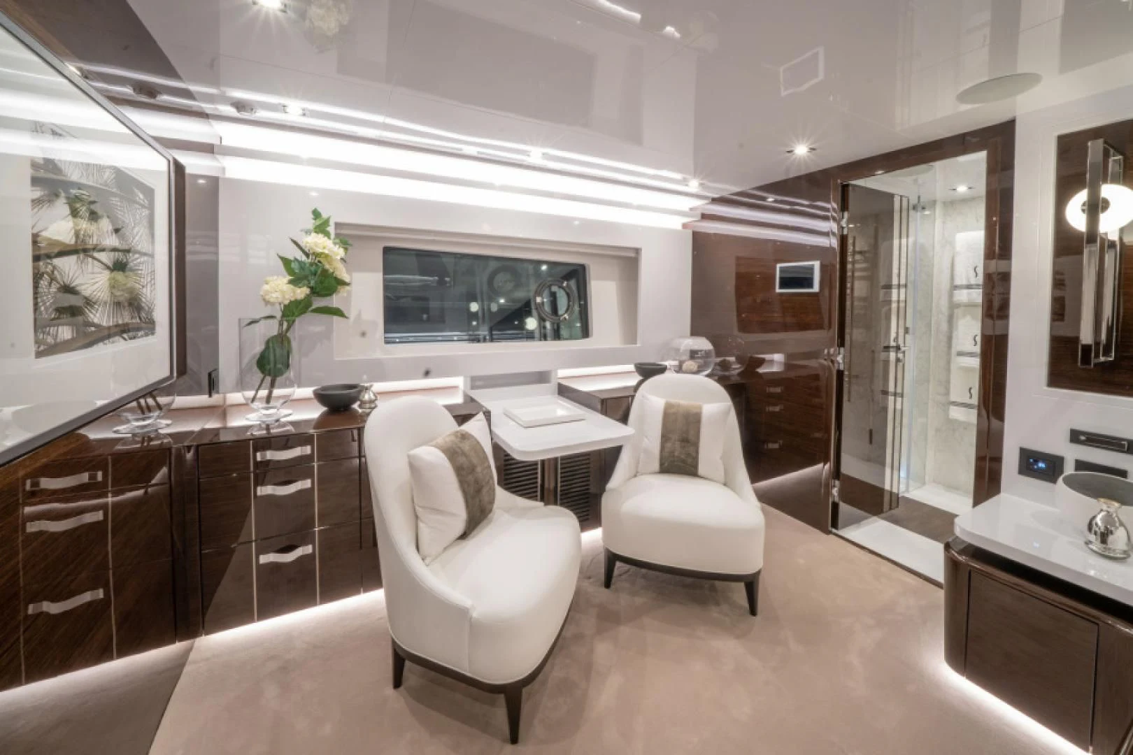 a room with a table chairs and a tv aboard PEARL Yacht for Sale