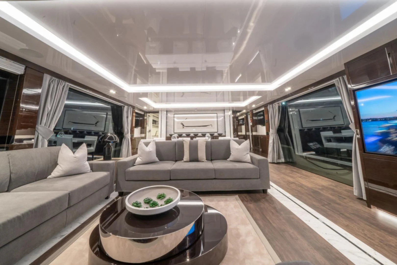 a living room with a large window aboard PEARL Yacht for Sale