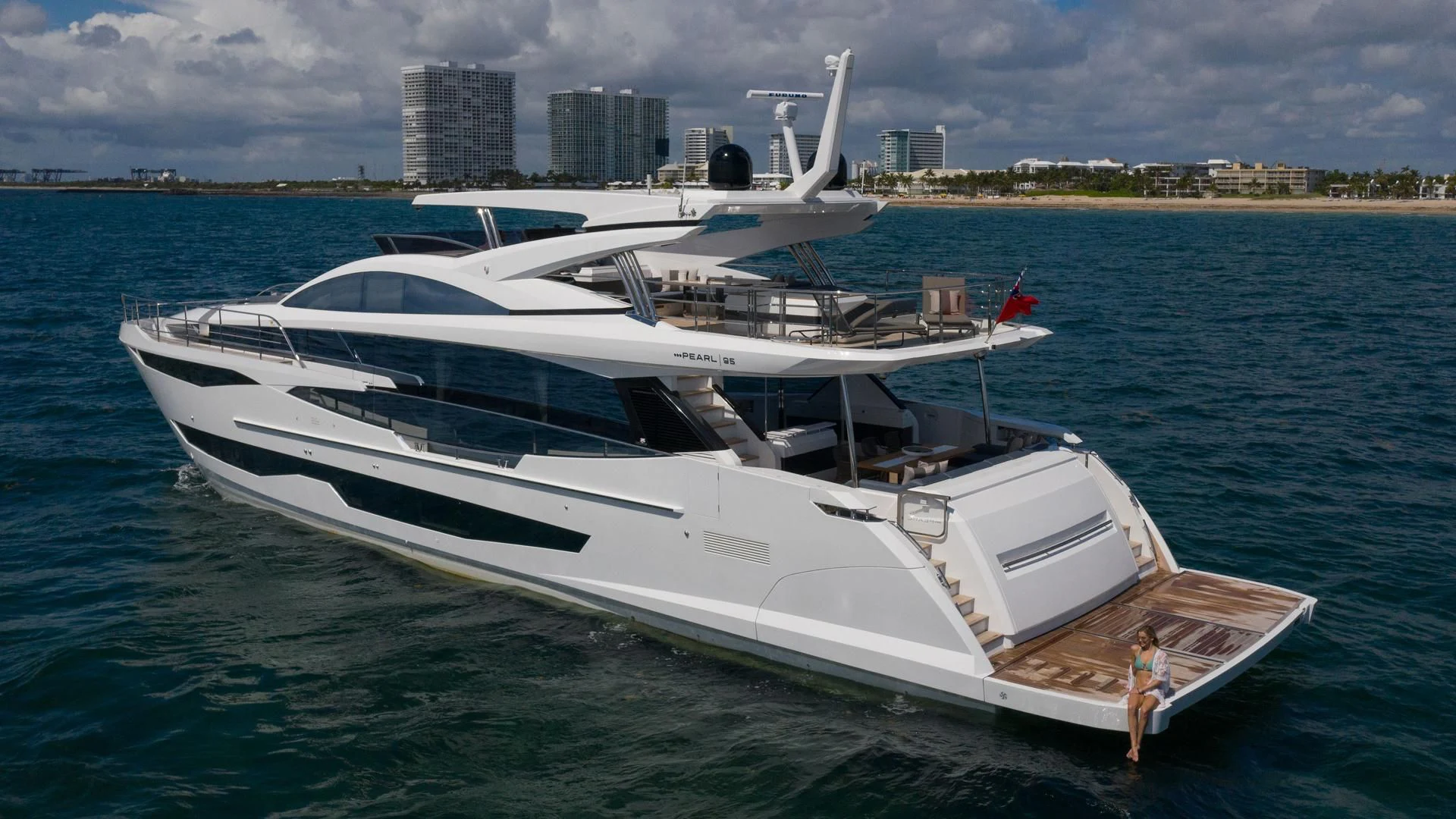 a white yacht in the water aboard PEARL Yacht for Sale