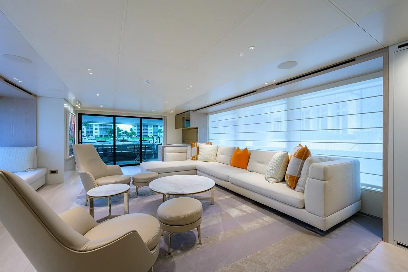 a living room with a large window aboard PEARL Yacht for Sale