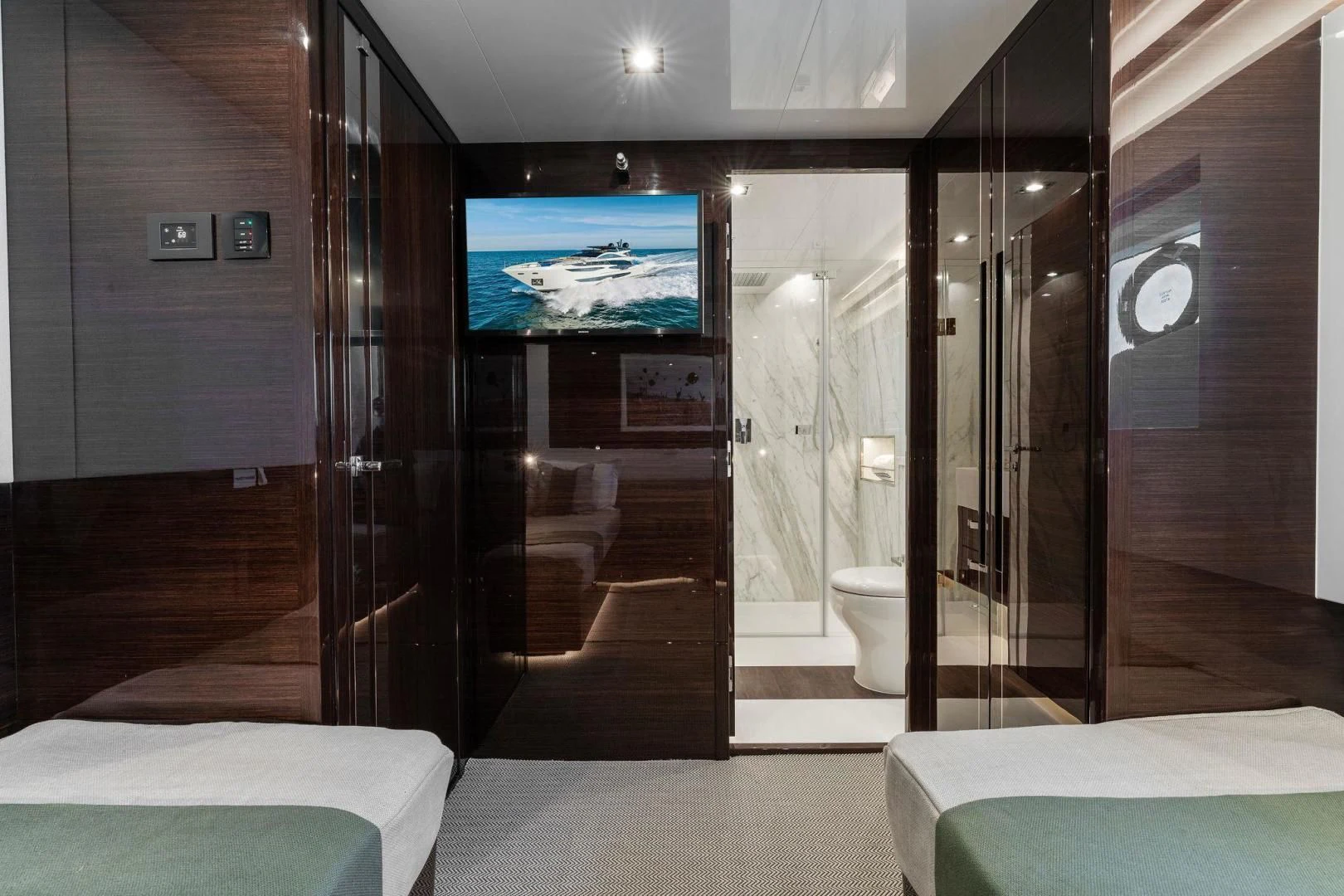 a bathroom with a large glass shower aboard PEARL Yacht for Sale