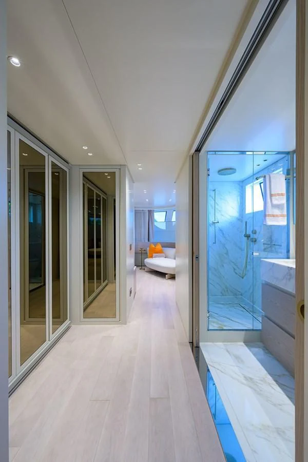 a room with a large blue door aboard PEARL Yacht for Sale