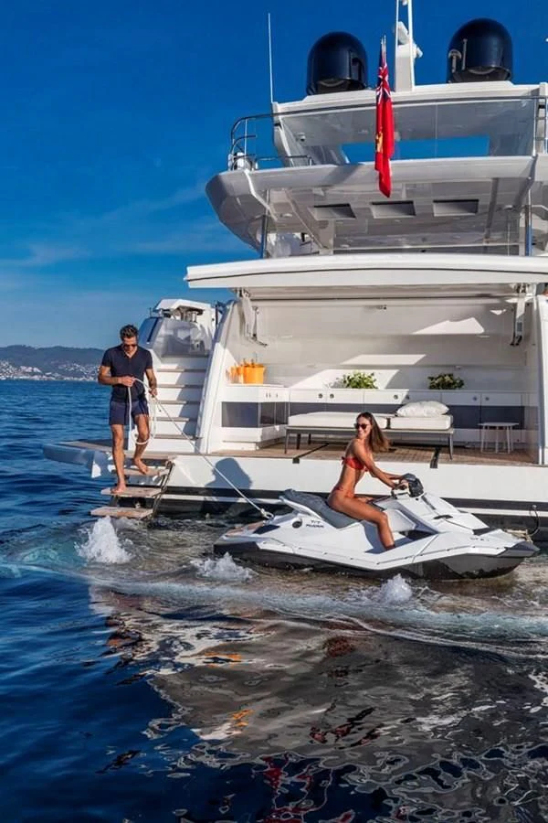 a man and woman on a boat aboard PEARL Yacht for Sale