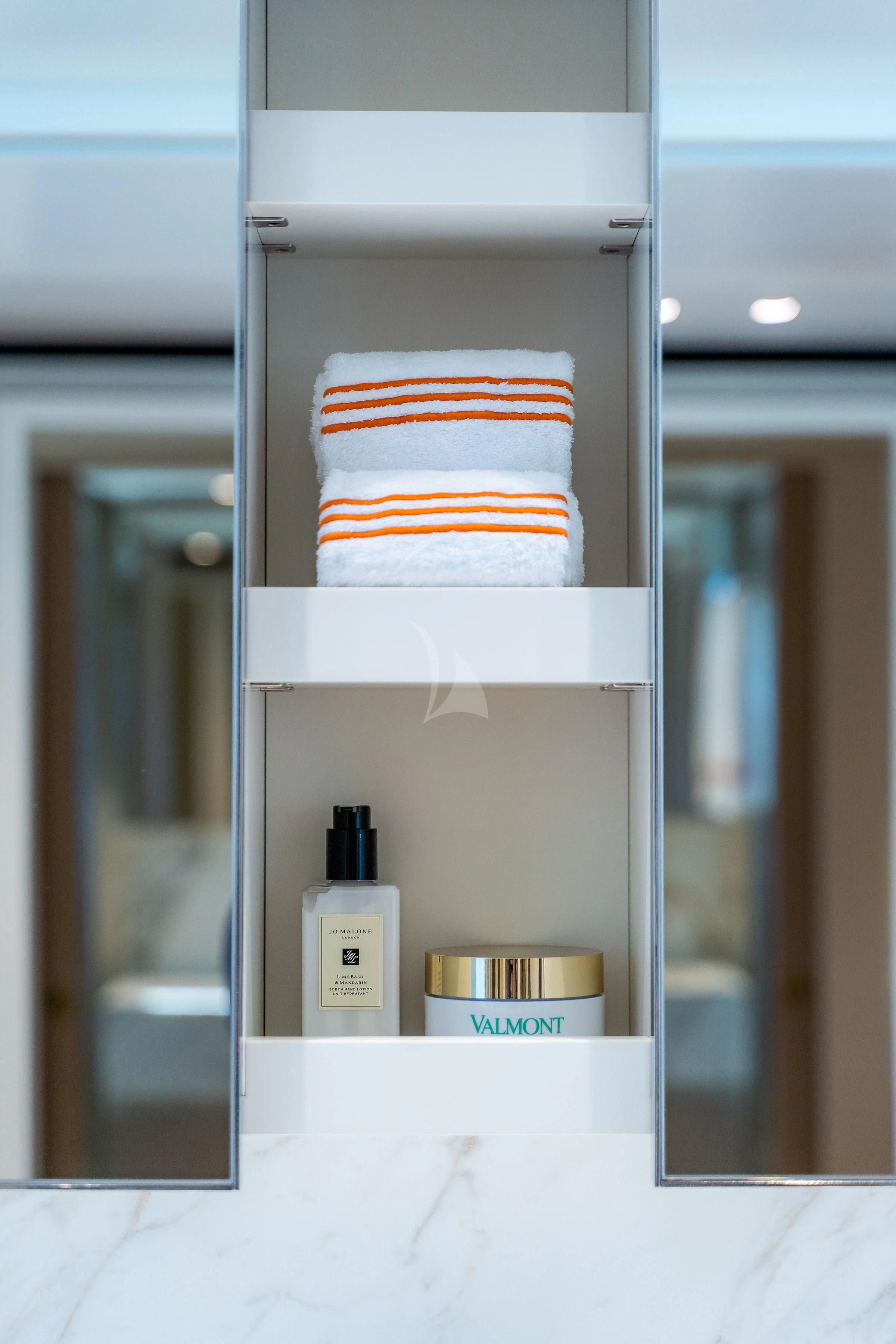 a white and orange object with a label on it aboard PEARL Yacht for Sale