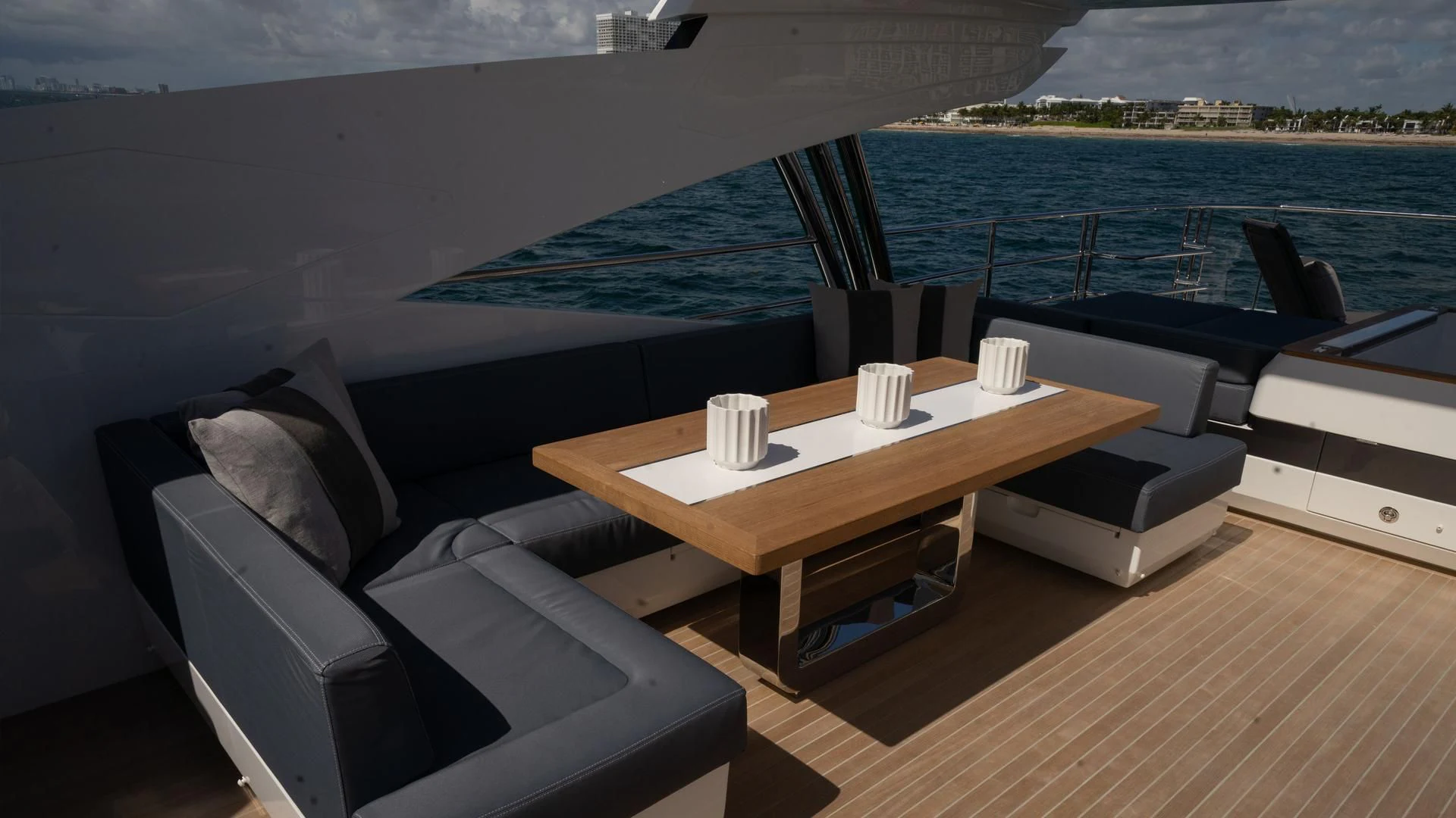 a room with a table and chairs aboard PEARL Yacht for Sale