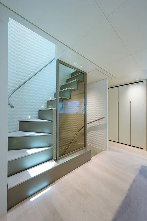 a glass wall with glass doors aboard PEARL Yacht for Sale