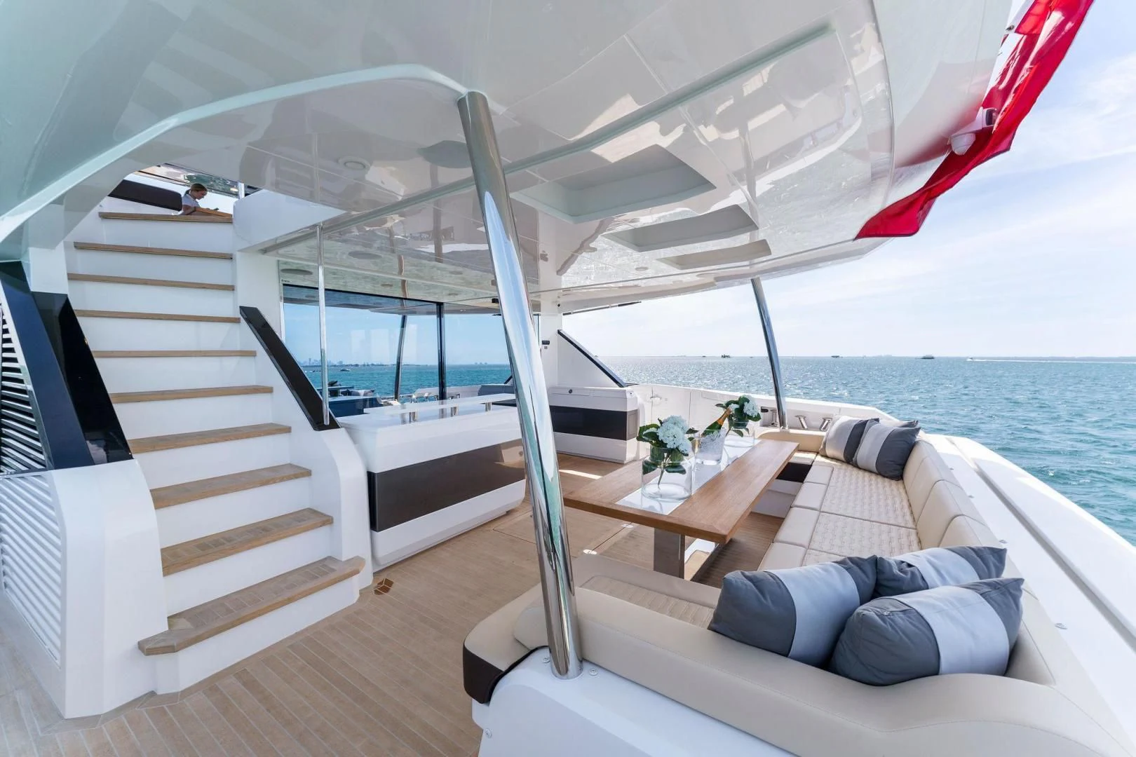 a boat with a bed and a table on the deck aboard PEARL Yacht for Sale