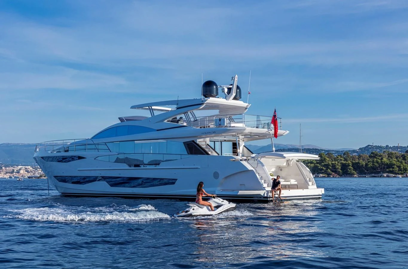 a white boat on the water aboard PEARL Yacht for Sale