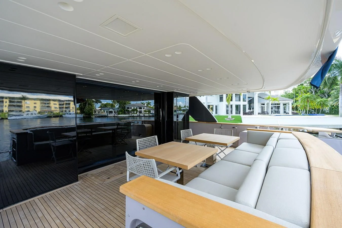 a room with couches and tables aboard PEARL Yacht for Sale