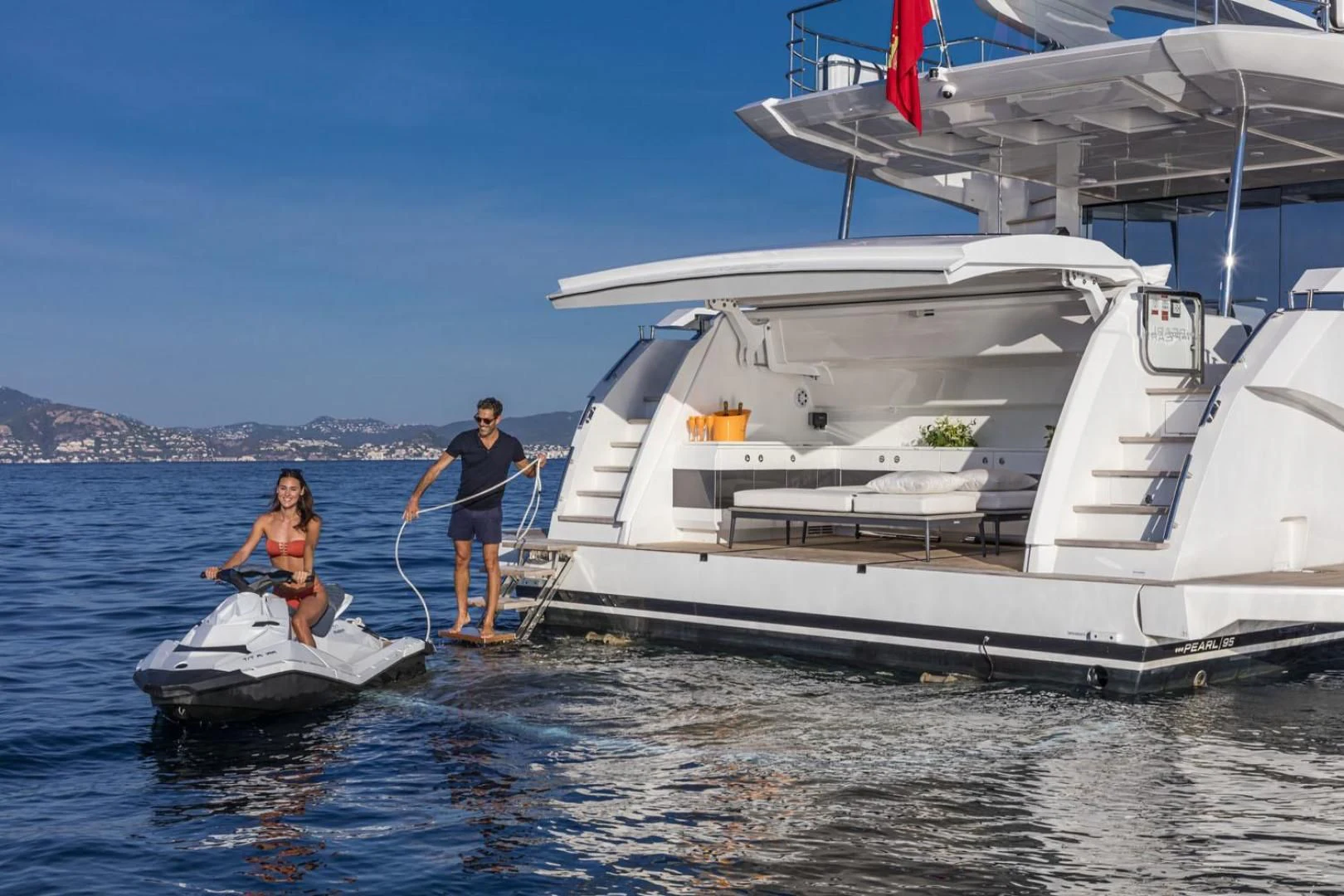 a couple of people on a boat aboard PEARL Yacht for Sale
